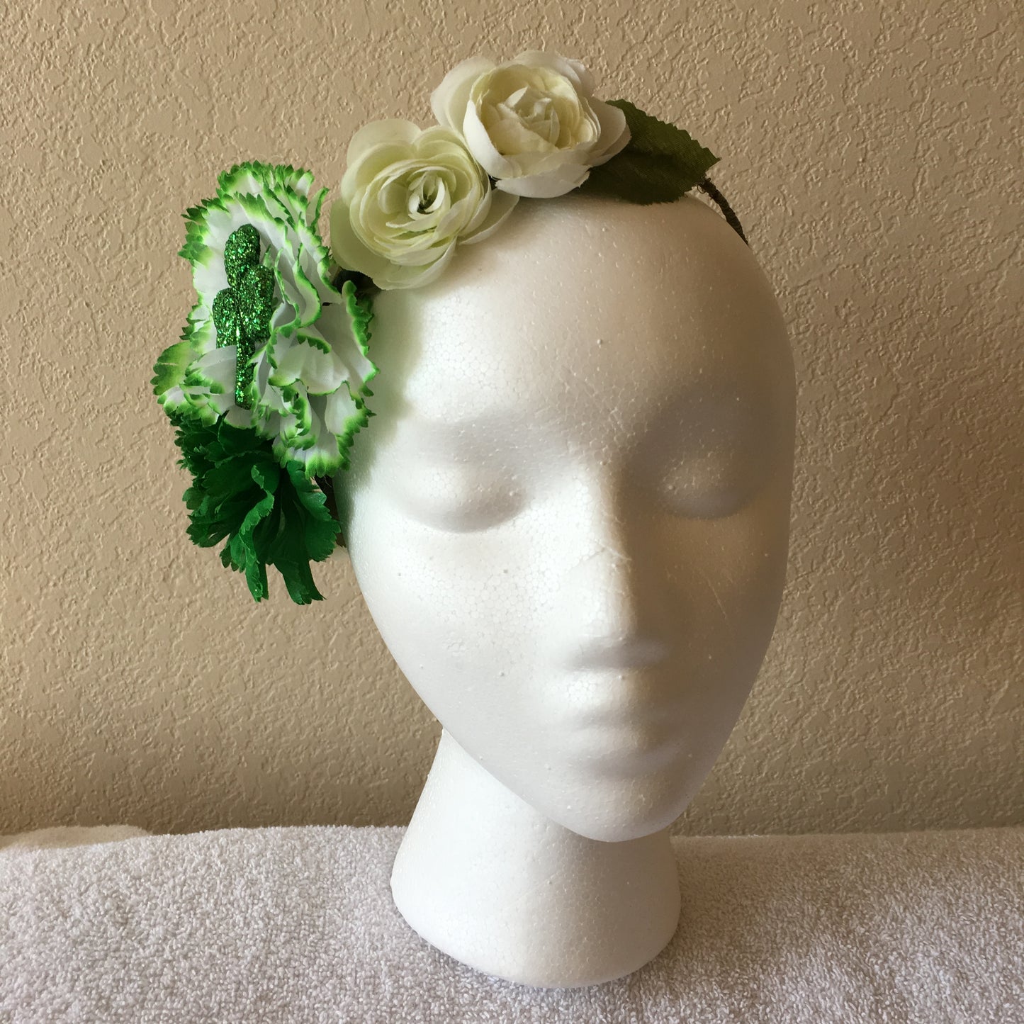 Show Special Side Wreath - Dark green & green tipped carnation w/ three pale green roses w/ one shamrock